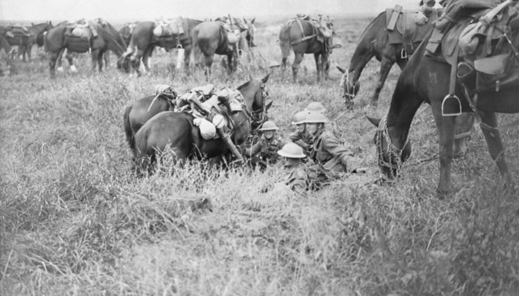 153_Canadian Cavalry take shelter in shellholes. Advance East of Arras. Sept. 1918.